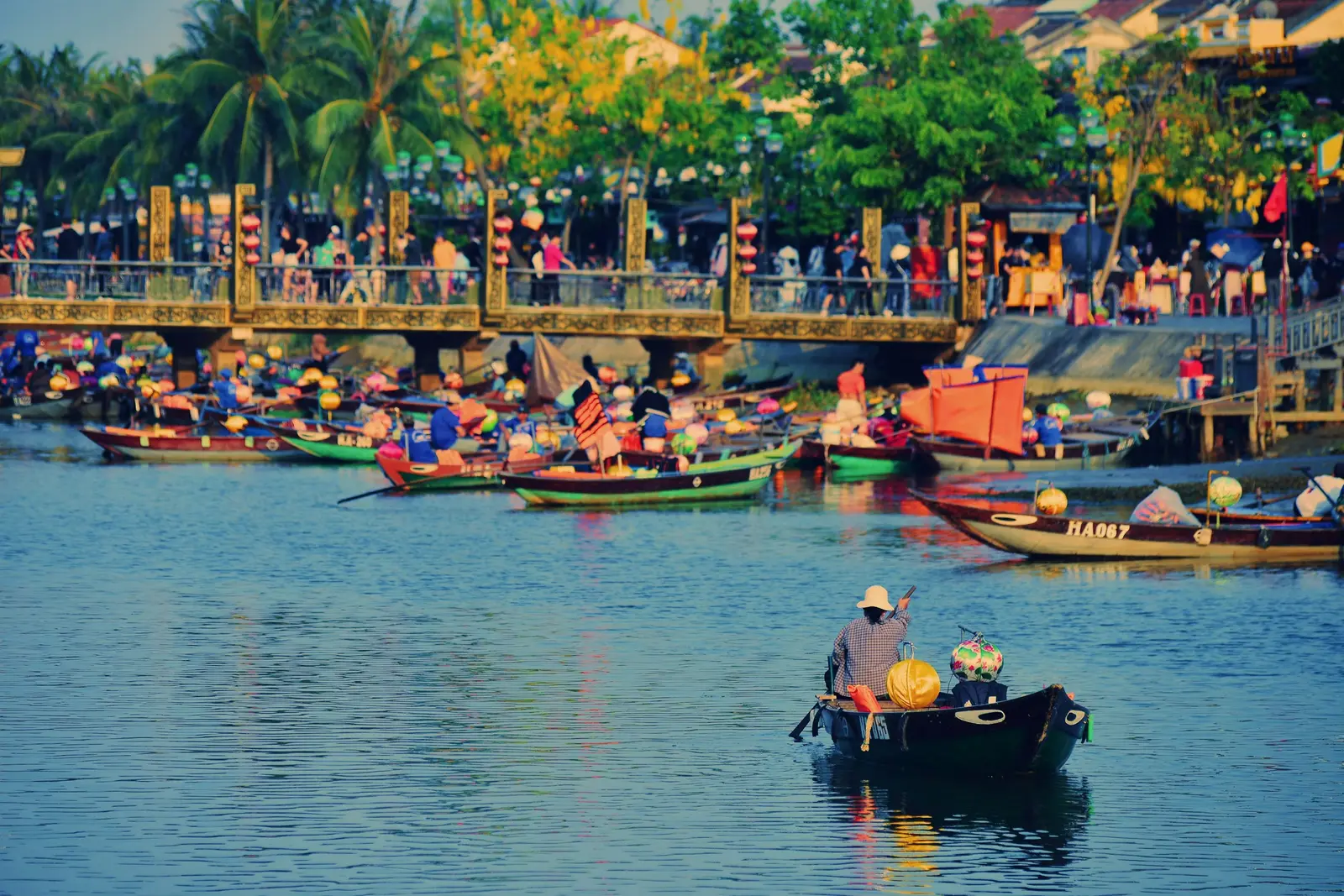 People in small boats on the river in Hoi An, Vietnam.